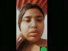 Cute Libyan teen cam girl delights with her charming smile
