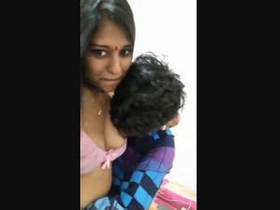 Lovely Indian girl gives a boob job to her partner