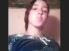 Watch a Desi girl show off her cute tits and pussy in a village