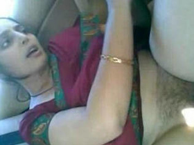Indian homemaker gives oral pleasure to her chauffeur in a vehicle