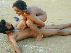 Desi couple enjoys a steamy encounter on the beach in leaked premium video