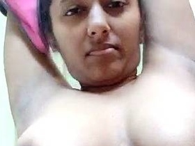 Watch this hot Indian babe show off her big boobs in a nude selfie video