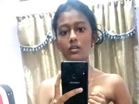 Nude Indian girl takes selfies and pleasures herself on camera