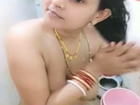 Nude Indian bhabhi takes a shower and masturbates