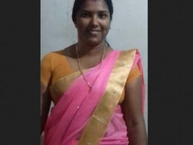 Watch a stunning Tamil bhabhi flaunt her big boobs in a steamy video