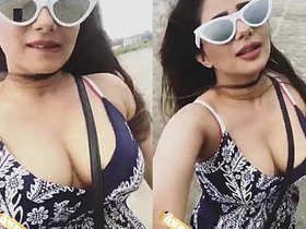 Desi beauty flaunts her curves on the shore