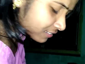 A beautiful Indian woman pleases her boyfriend with oral sex