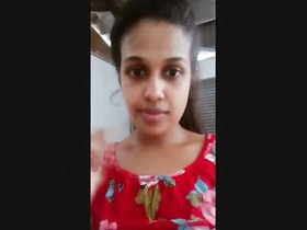 A stunning Sri Lankan woman flaunts her breasts in this online video