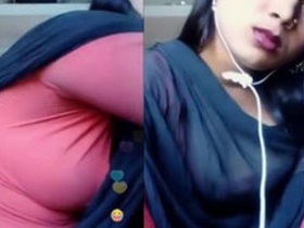 Indian girl playing with her body in a seductive manner
