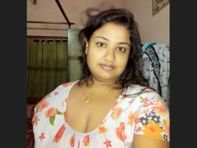 Cute desi bhabhi showers her big boobs in the shower