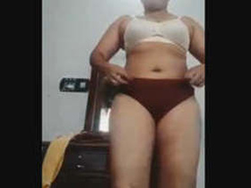 Curvy bhabhi flaunts her big tits and pussy on camera