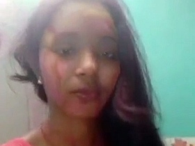 Indian girl strips down after Holi festival in sexy video