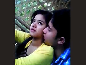 Cute couple smooching in lonely place