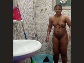 Elderly Indian wife takes nude selfies in the bathroom