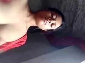 Boudi flaunts her breasts and vagina in a seductive manner