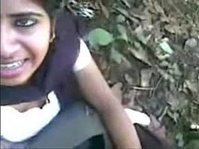 Tamil schoolgirl gives a blowjob in the forest