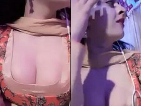 Married woman's cleavage and breasts on display at wedding celebration