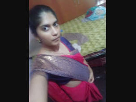 Busty Indian girl flaunts her assets in a steamy video