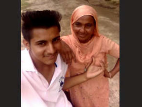 Bhabhi's big boobs push against the heat