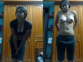 A gorgeous teen strips down and masturbates with her fingers