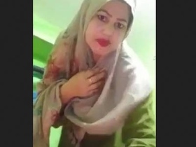 Naughty hijabi wife strips down and shows off her curves