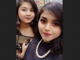 Watch a busty Indian girl show off her assets in this video