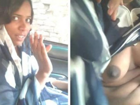 Desi babe reveals her boobs and gives a blowjob in a car