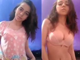 Young woman strips naked and films herself for her own pleasure