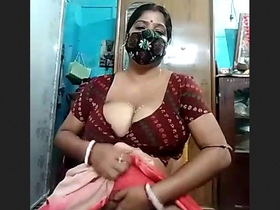 Desi aunty with big boobs gets sensual in a steamy video