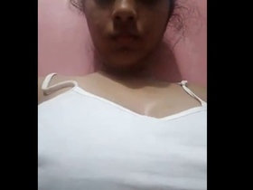 Indian girl shows off her huge boobs and masturbates on camera