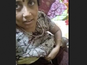 Mature Indian woman gives a sensual handjob to her partner