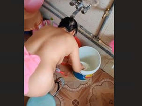 Desi bhabhi's secret bathing session caught on camera